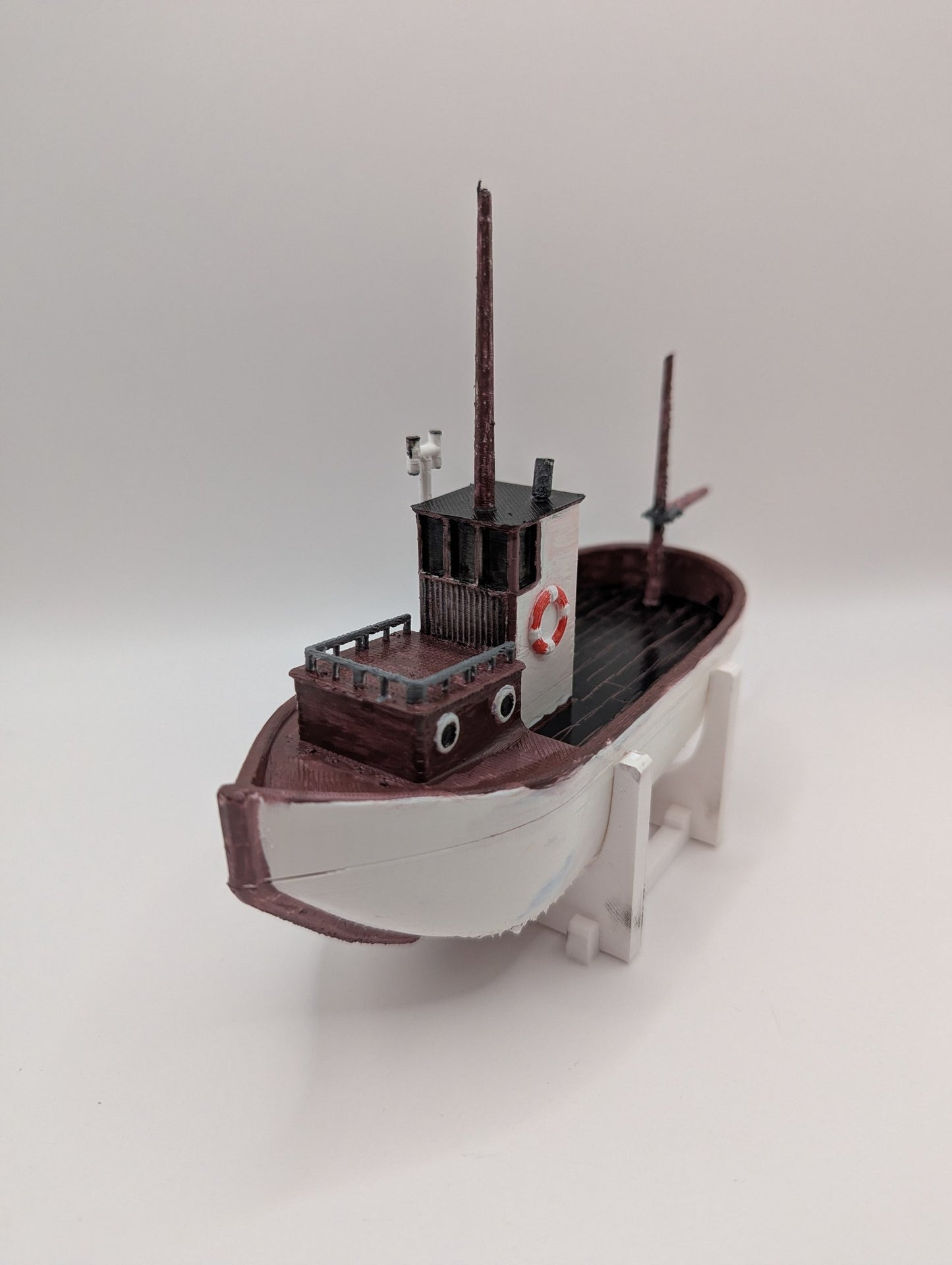 Referans görsel — model: Minyatür Balıkçı Teknesi No.19 · tasarım: Glein91 (printables). Wefty Design'in kendi baskısının fotoğrafı değildir.